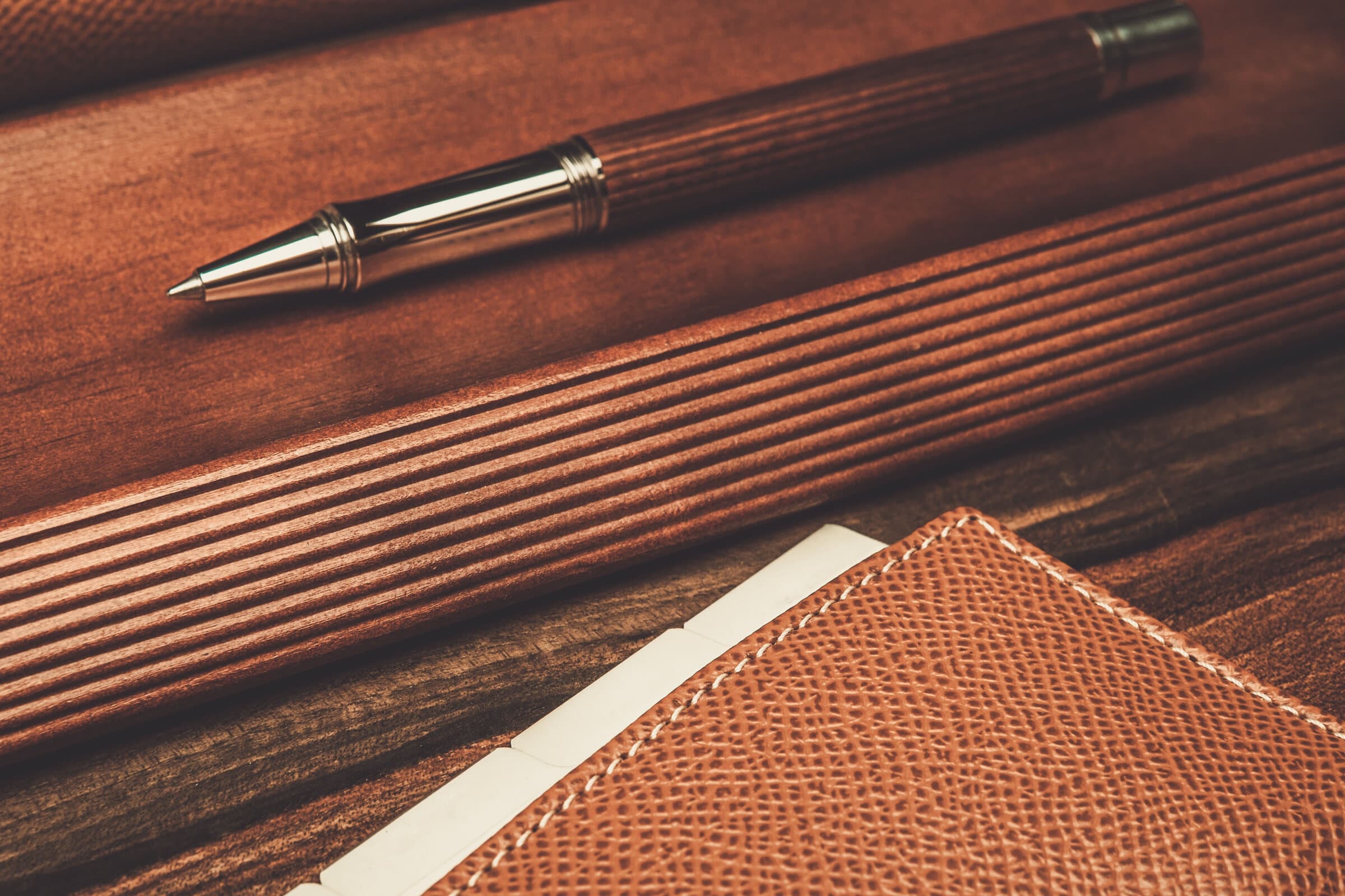 Pen beside signature blocks on legal form